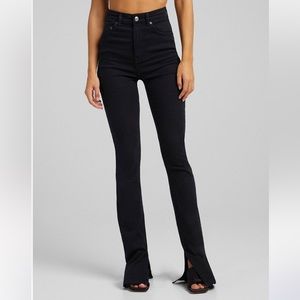Bershka high waist skinny jeans with split hem detail in black